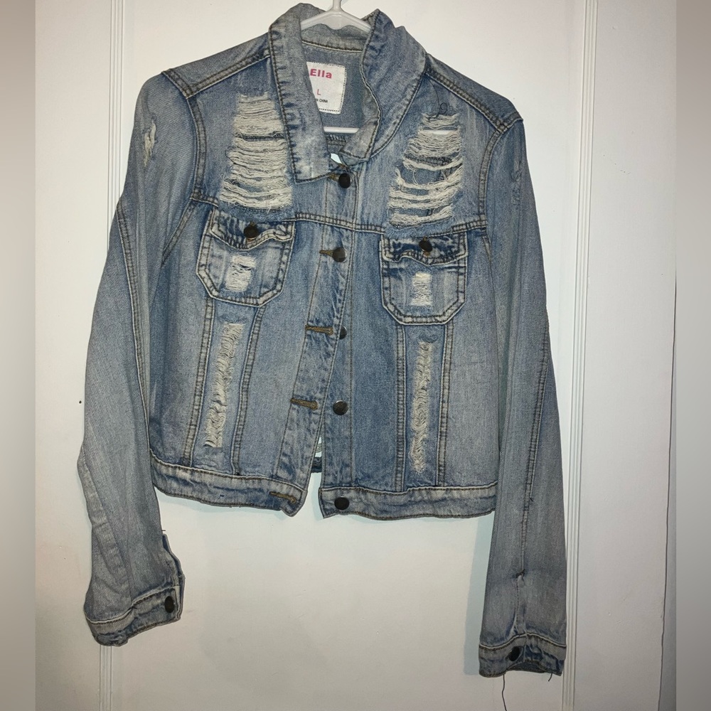 Ripped denim jacket. Size large